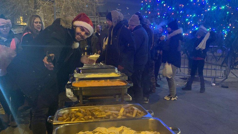Jack Meldrum serving food