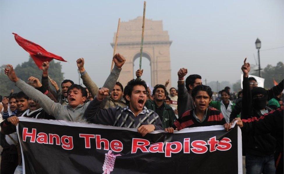 Indian demonstrators shout slogans during a protest calling for better safety for women following the rape of a student last week, in front the India Gate monument in New Delhi on December 23, 2012.