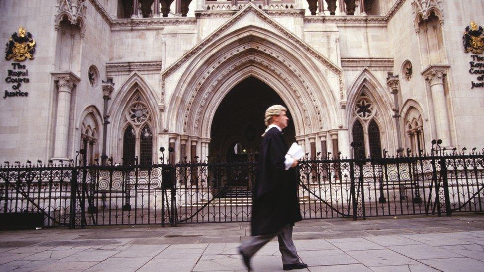 A barrister outside the Royal Courts of Justice