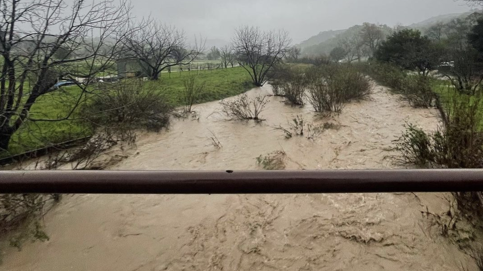 the flooded creek going through campus