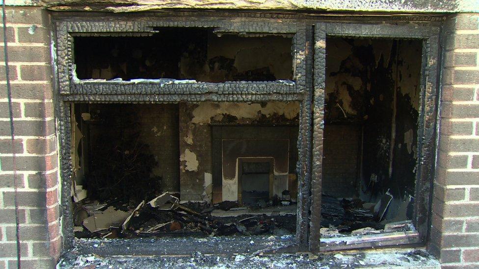 The living room of the fire-damaged house