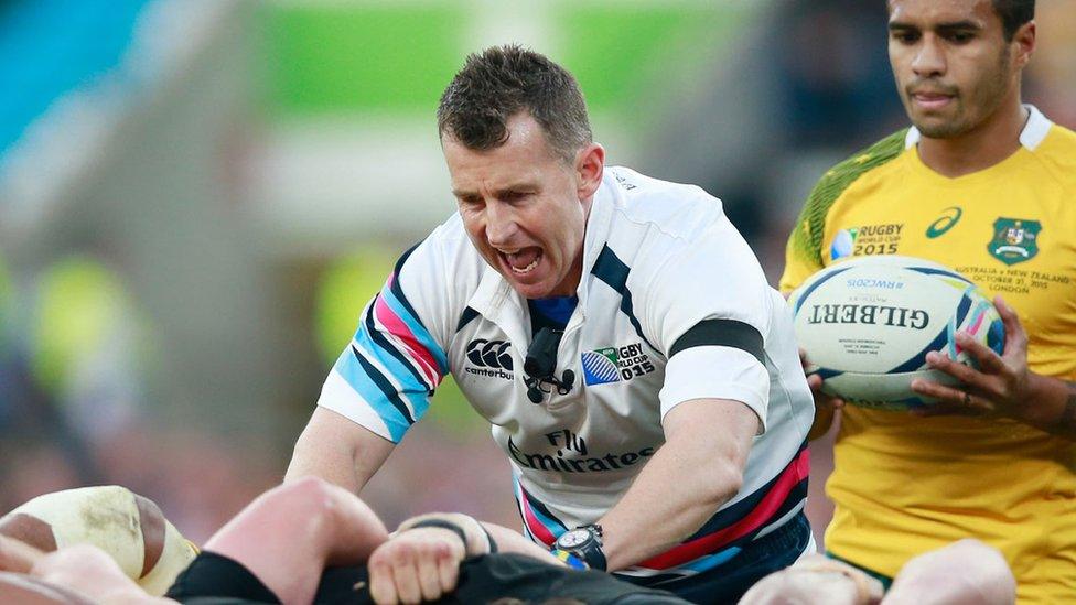 Nigel Owens takes control at a scrum in the 2015 World Cup final