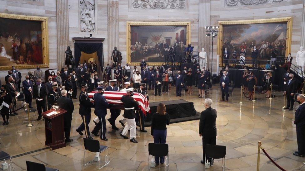 The casket of US Representative from Georgia John Lewis arrives during a ceremony preceding the lying in state in the Rotunda of the US Capitol in Washington, DC