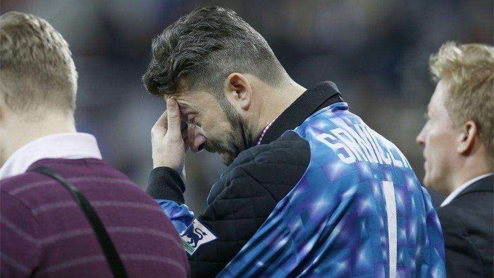 Milan during a minute's silence for his number