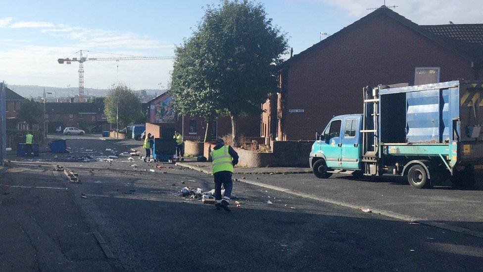 Belfast City Council workers cleaned up after a day of trouble in Belfast