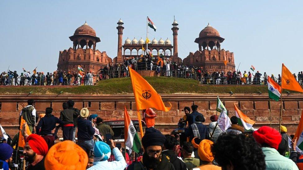 Farmers take part in a tractor rally as they continue to protest against the central government's recent agricultural reforms, in front of Red Fort in New Delhi on January 26, 2021.