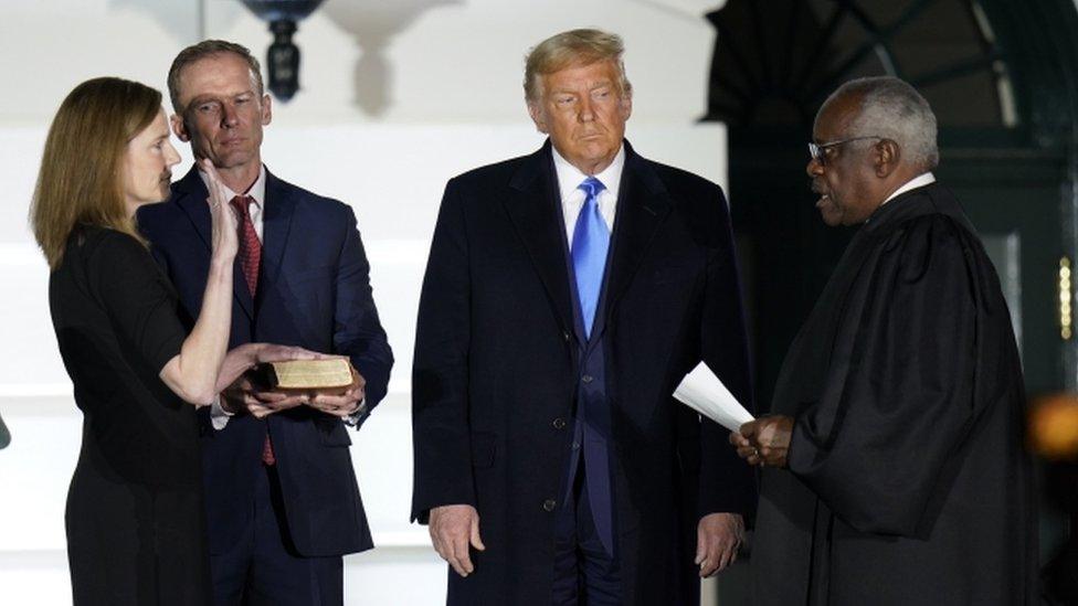 (left to right) Amy Coney Barrett, her husband Jesse Barrett, President Donald Trump, Justice Clarence Thomas at the White House, 26 October 2020