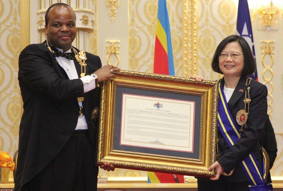 Swaziland absolute Monarch King Mswati III (L) poses with Taiwan President Tsai Ing-wen (R) after awarding her with the Order of the Elephant during her visit to the Kingdom of Swaziland at an official ceremony on April 18, 2018 in Lozitha Palace, Manzini.