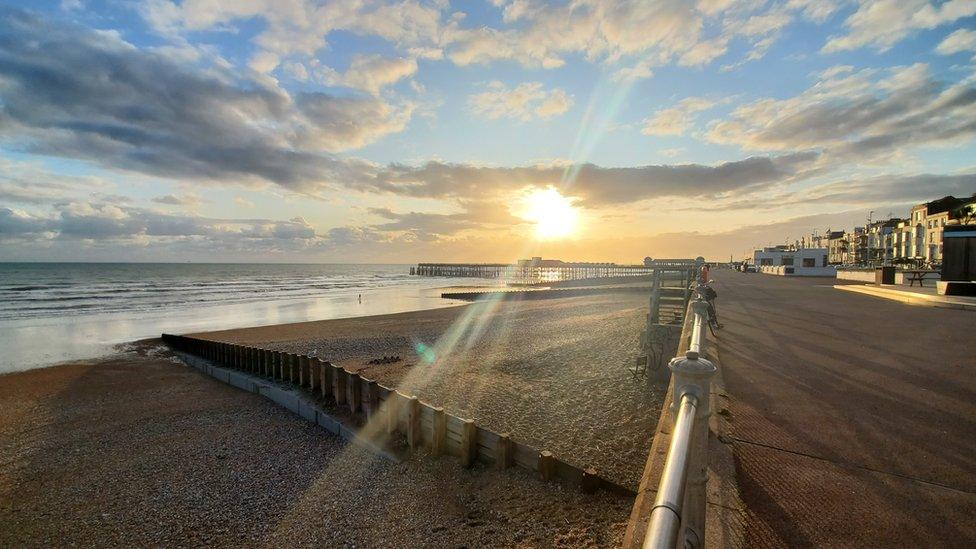 The sun shines over the sea front in Hastings - with nary a bar chart in sight