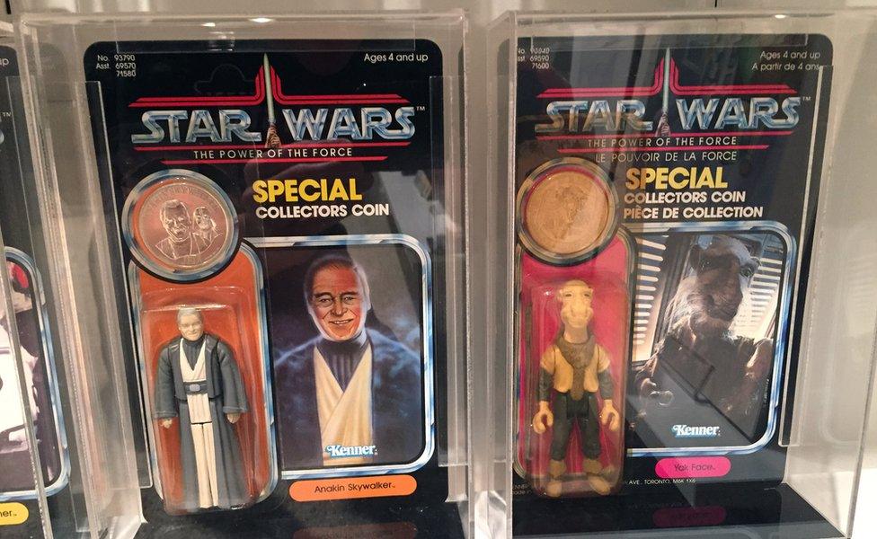 Figures in their original packaging