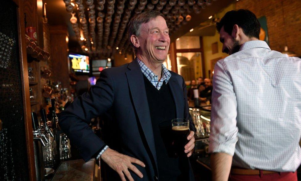 Hickenlooper at a bar in Iowa