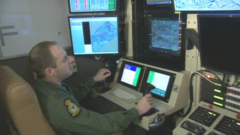 A member of RAF personnel showing the drone interface