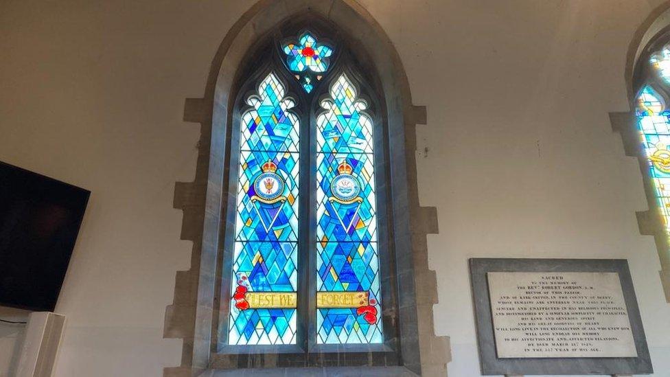 The stained glass window