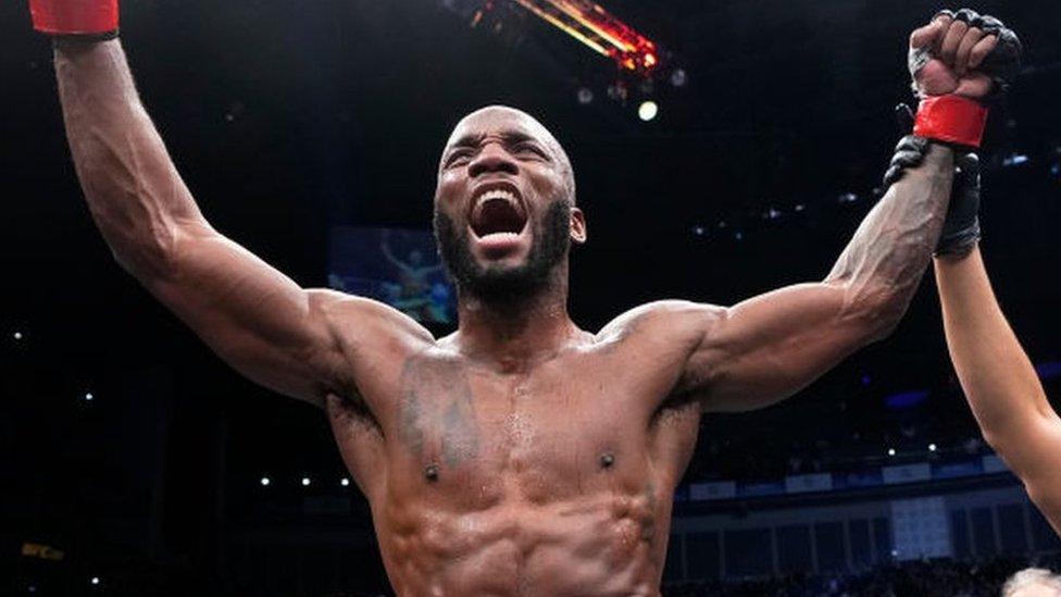 Leon Edwards celebrates beating Kamaru Usman