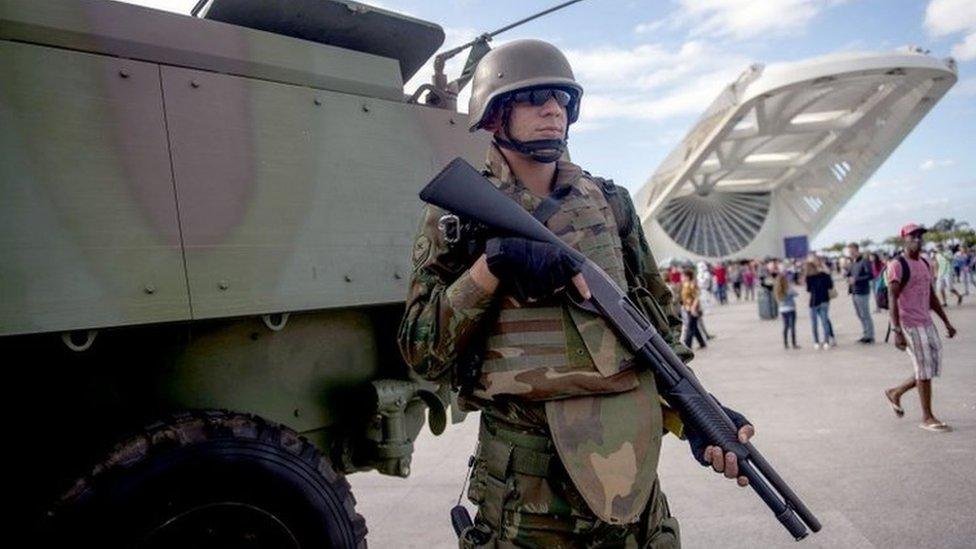 Brazilian marines with armoured personnel carriers (APC) stand guard at the Museum of Tomorrow area in the Portuary Zone of Rio de Janeiro, Brazil, on July 29, 2017.