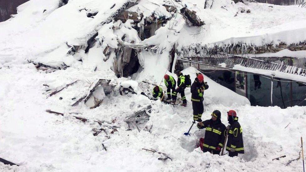 Rescuers at the ruins of the Rigopiano hotel, 19 january