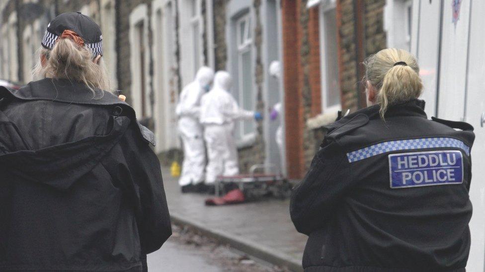 Police officers at the scene in Treforest after the body was found