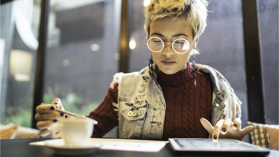 Woman using a tablet computer