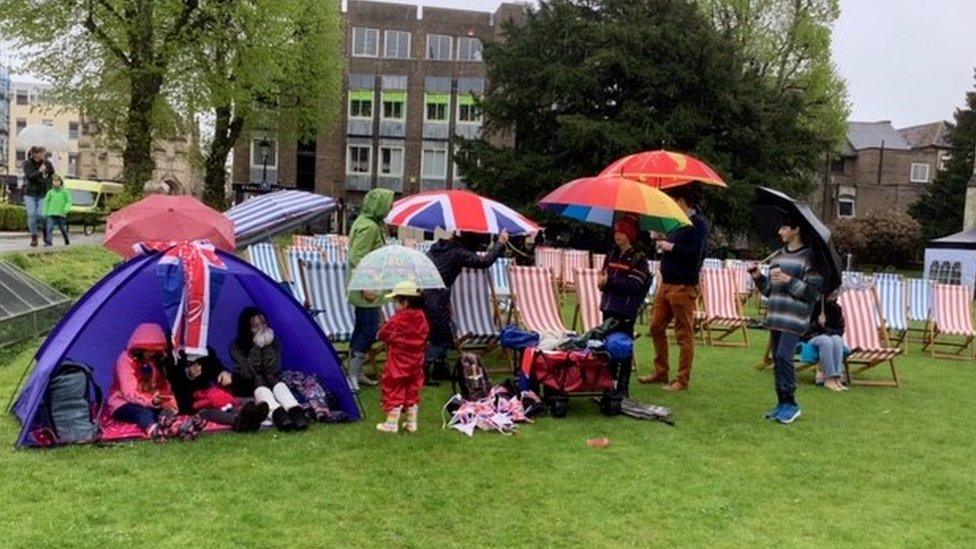 Crowds in wet weather in Chichester