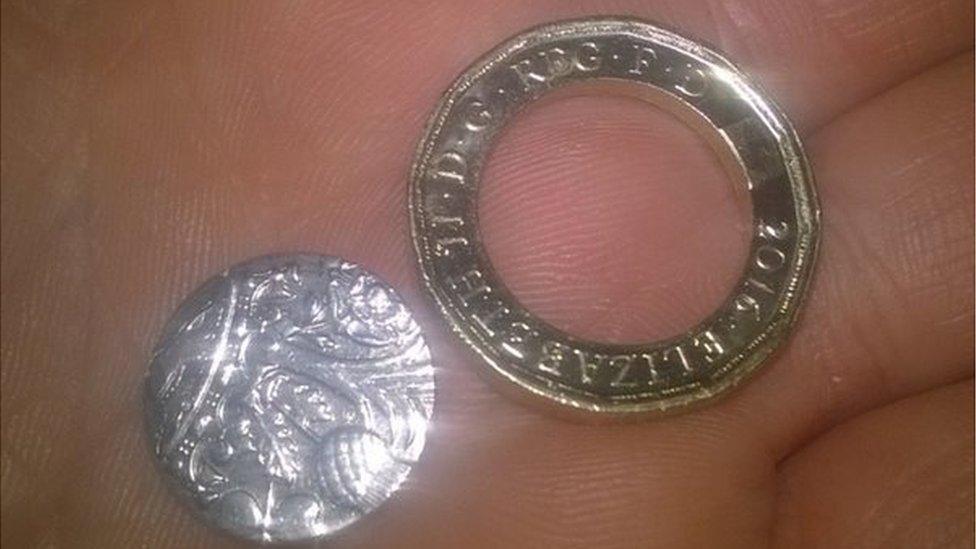 Broken new pound coin