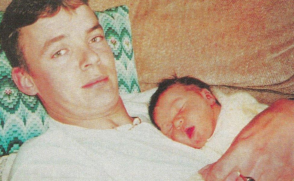 Simon Smith with his baby daughter Lauren