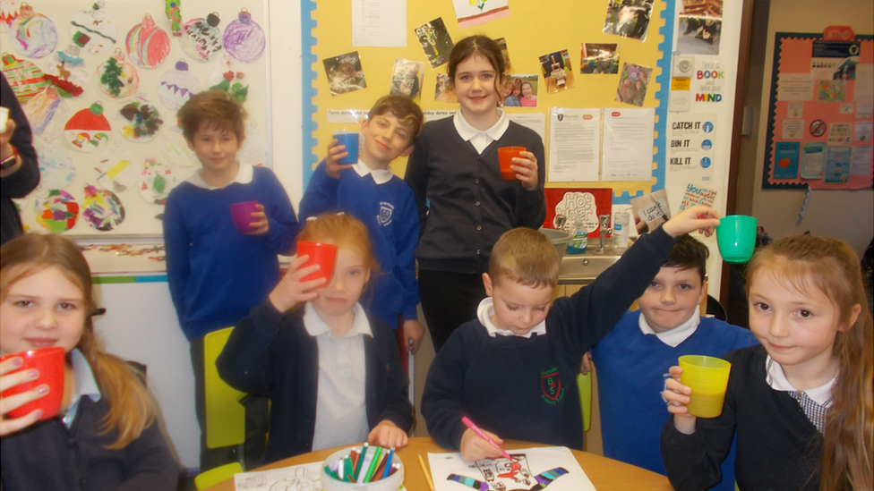 XTND after-school club pupils around a table