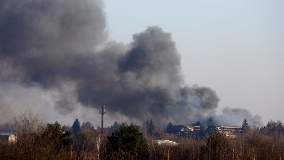 Smoke rises above buildings near Lviv airport