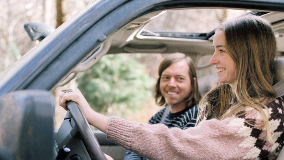 Young couple driving