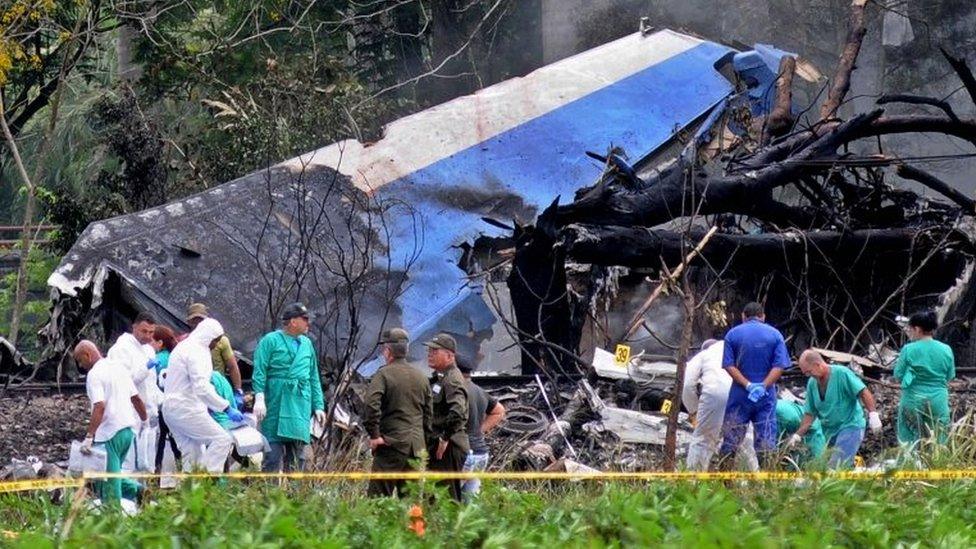 Police and military personnel work among the wreckage of the Boeing-737 plane that crashed shortly after taking off from the Jose Marti airport in Havana, Cuba, 18 May 2018