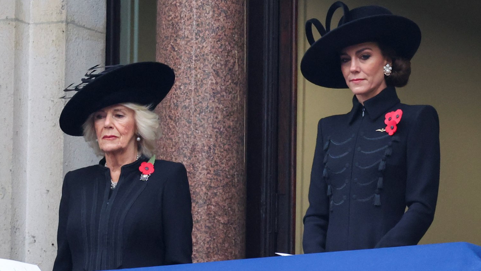 Queen Camilla and the Princess of Wales watch on as the Remembrance Sunday service takes place on Whitehall