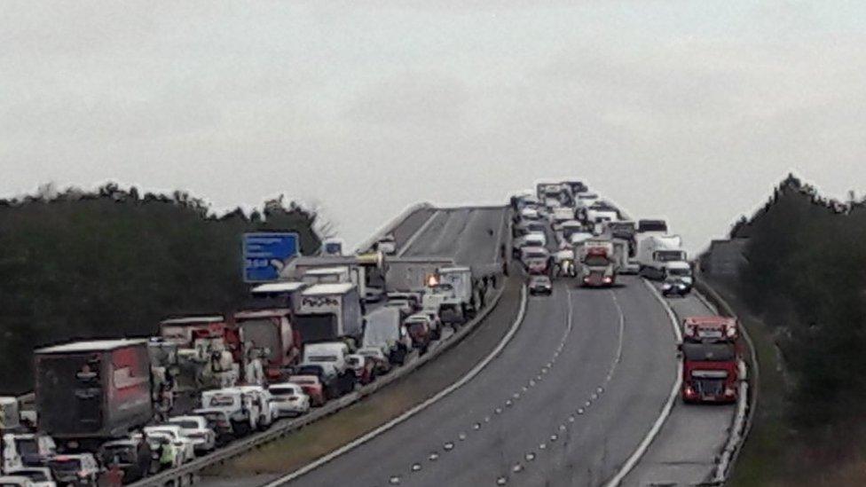 Tailback of cars on both sides of M62