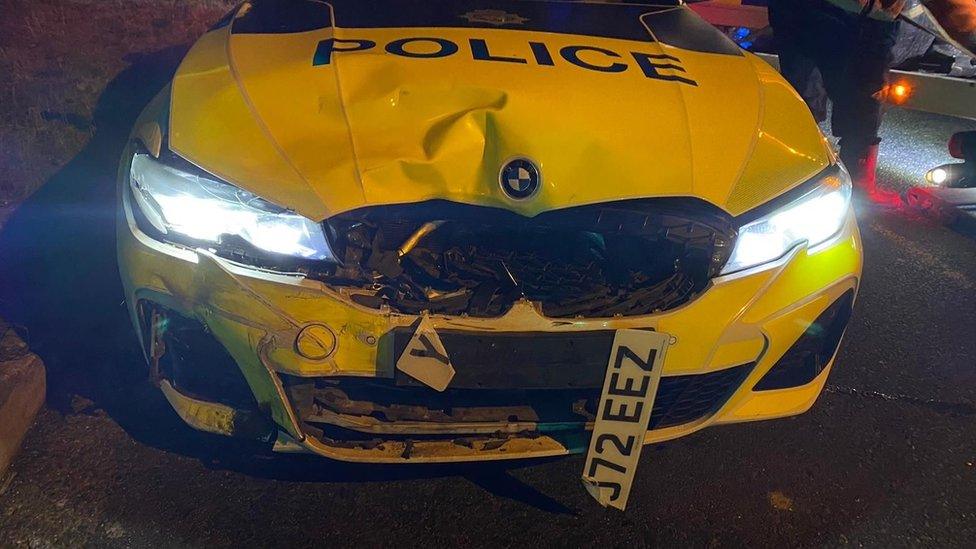 Damaged police car