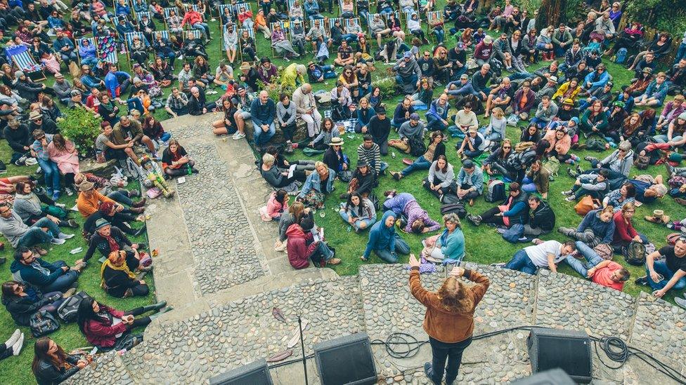 Poet Kate Tempest performs a spoken-word set in Portmeirion Village.