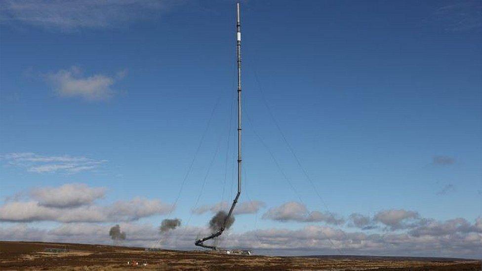 The Bilsdale mast being brought down in a controlled explosion