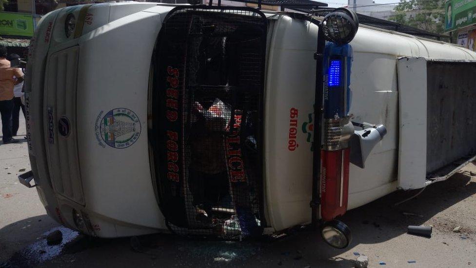 Police car overturned in protests