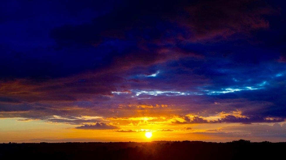 The sun setting over Cowbridge was taken by David McNaught