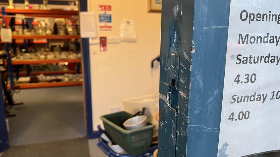 Damaged front door at Farleigh Hospice's warehouse in Maldon.