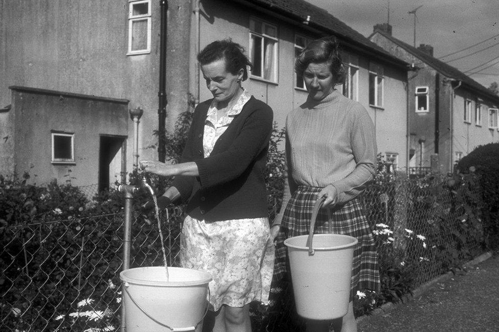 Women use a standpipe in August 1976