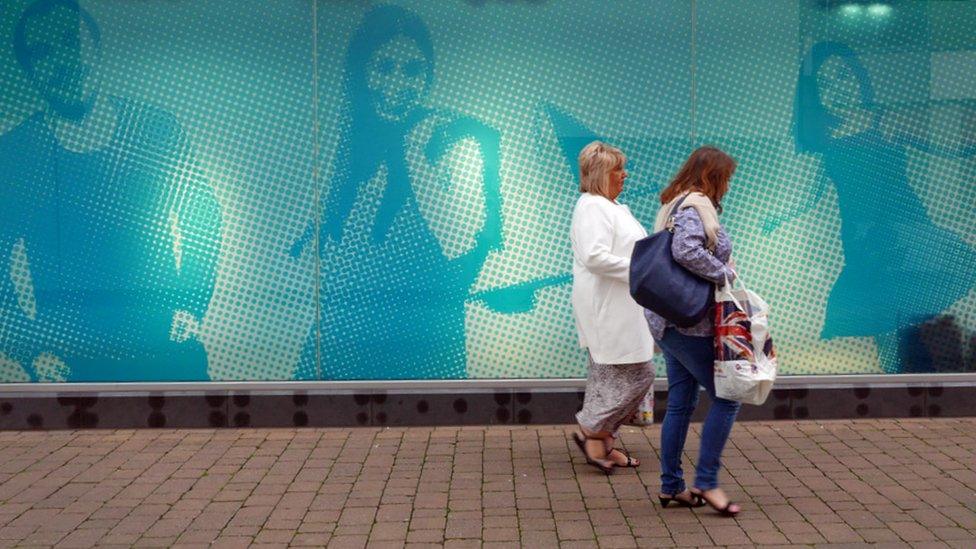 Shoppers in Corby