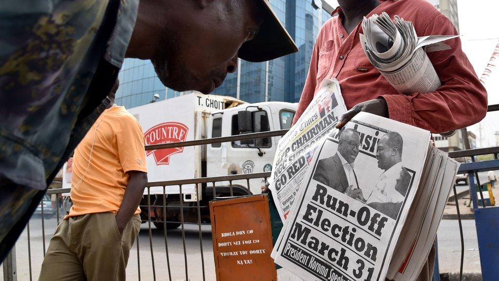 Man reads newspaper