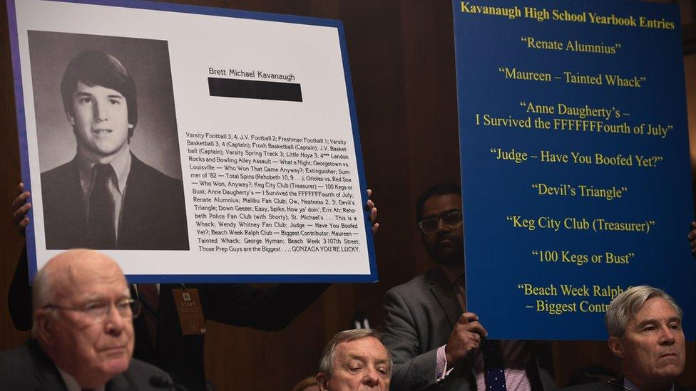 Extracts of Supreme Court nominee Brett Kavanaugh"s high school yearbook are displayed as he testifies before the US Senate Judiciary Committee on Capitol Hill in Washington, DC