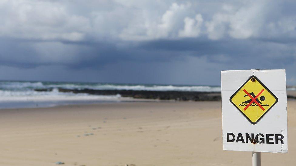 Beached closed sign