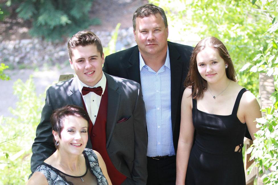 Evan Thomas with parents and sister