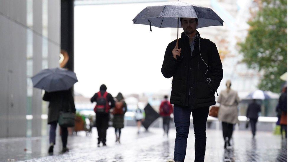 Commuters walking near Tower Bridge