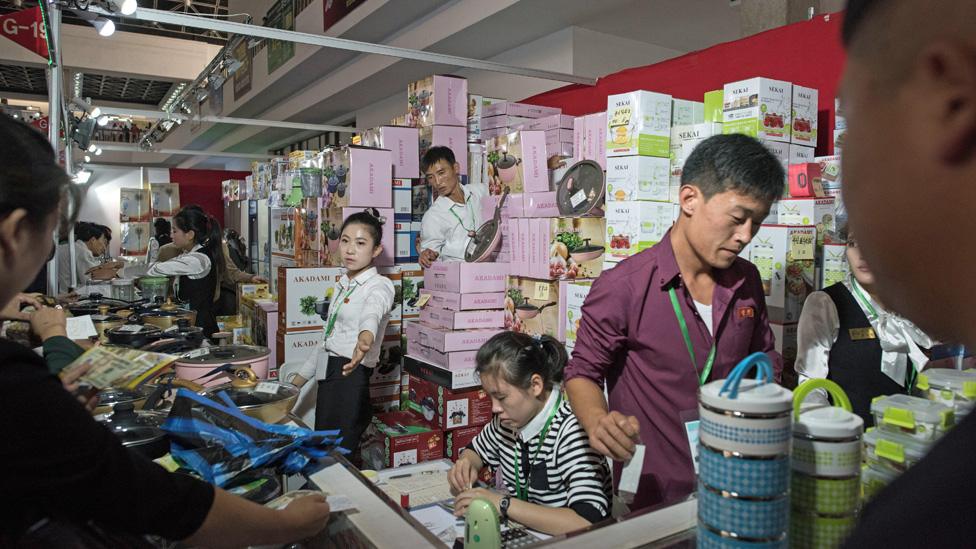 North Korea stallholders at the Pyongyang trade fair, September 2017