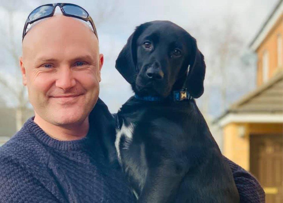 PC Simon Shaughnessy with puppy Reggie