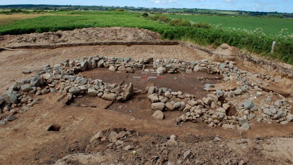 Remains of a house found at Rhuddgaer, near Newborough by the Gwynedd Archaelogical Trust