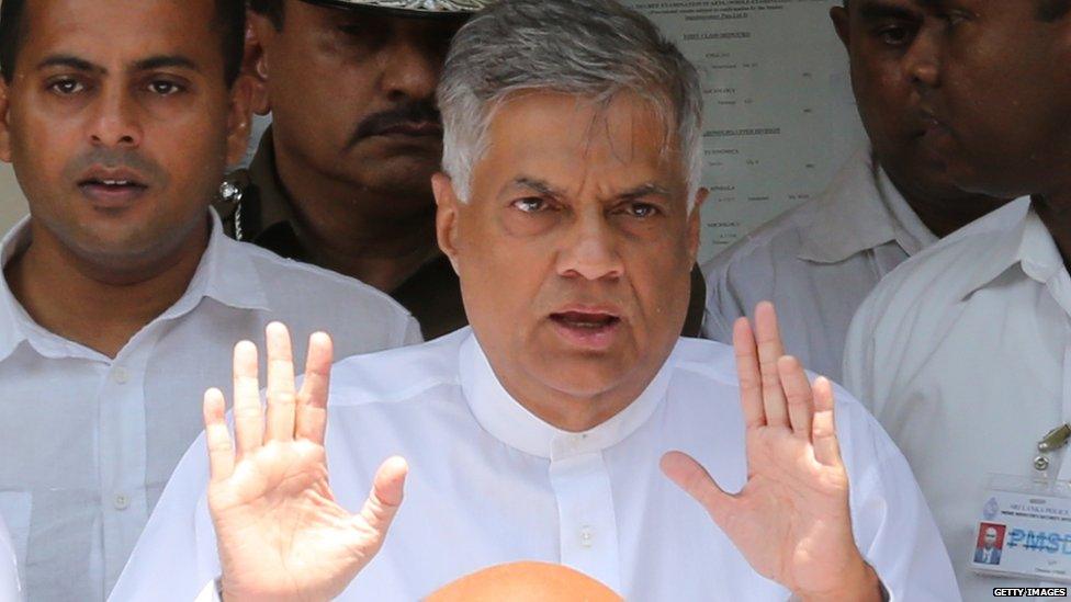 Sri Lankan Prime Minister Ranil Wickremesinghe of the United National Party gestures after casting his vote in the General election on August 17, 2015 in Colombo, Sri Lanka