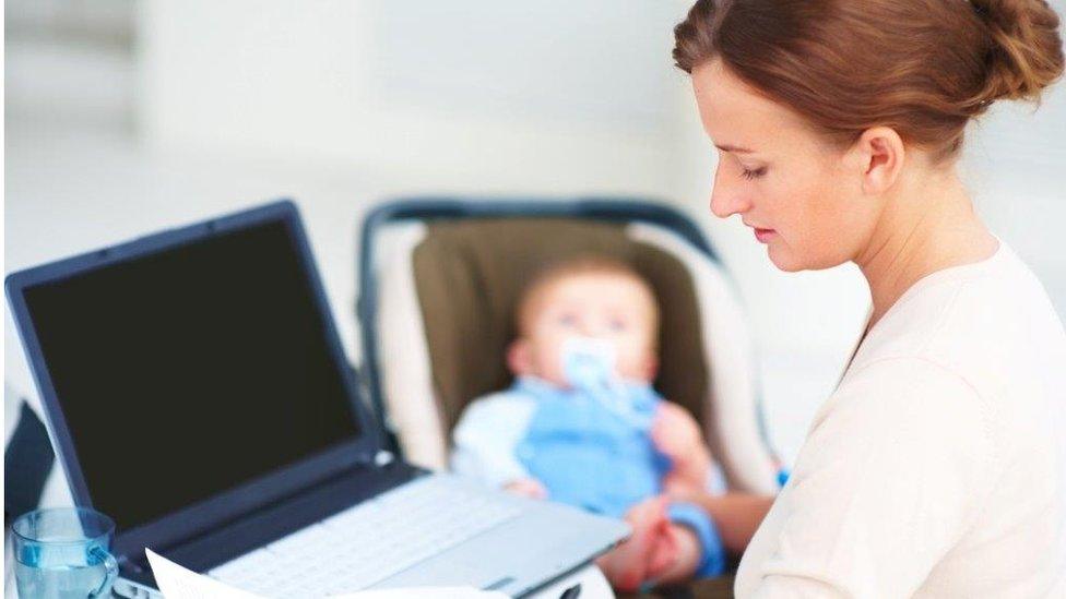 Young woman worker with baby