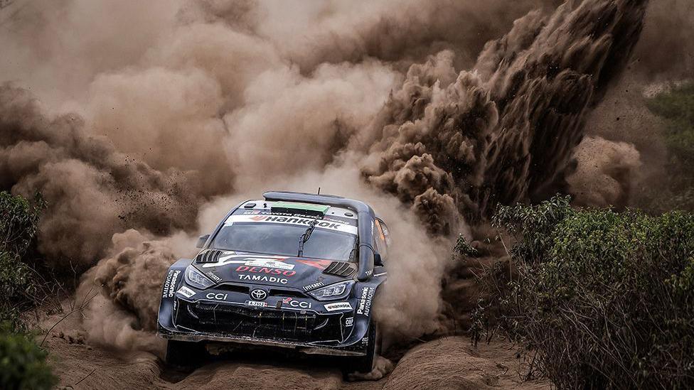 Toyota Gazoo Racing WRT's British driver Elfyn Evans steers his Toyota GR Yaris Rally1 with British co-driver Scott Martin during the World Rally Championship (WRC) Safari Rally Kenya Special Stage 7 (SS7) in Gilgil on March 21, 2025.